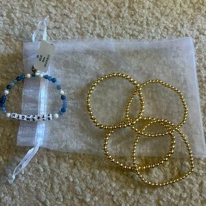Gold and blue Bracelets from little word project,